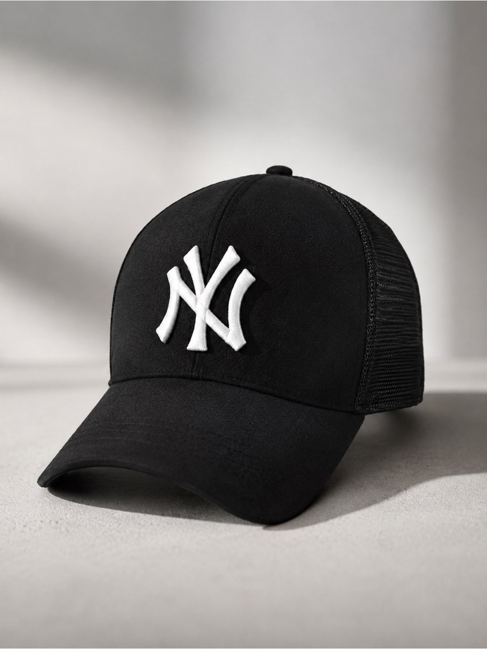 New Era Black Trucker Cap with White NY Logo